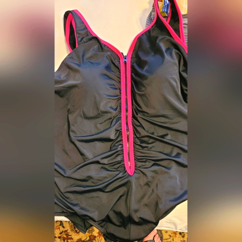 Black Swimsuit with Pink Trim. NWT